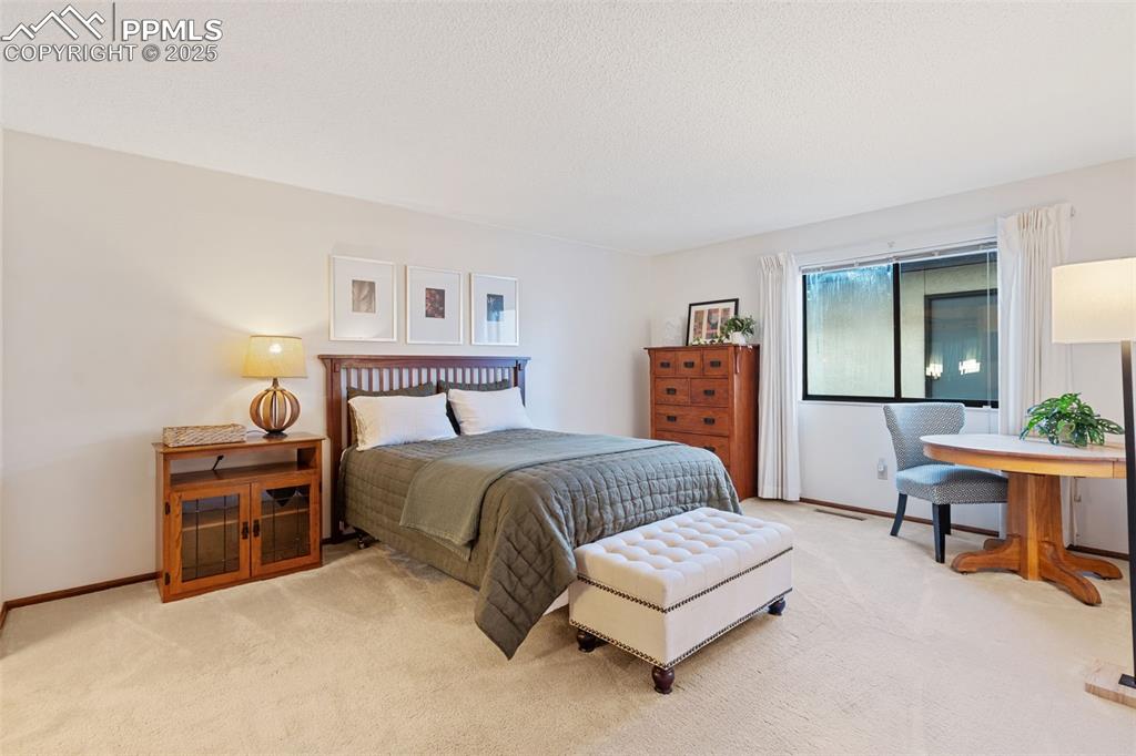 Image 21 of 28: The oversized primary suite will be your private retreat. So much space in 