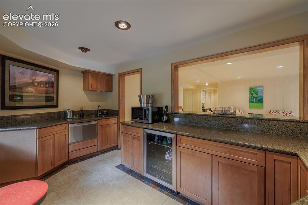 Image 30 of 50: Wet bar with its own drawer dishwasher, sink & wine cooler/fridge!