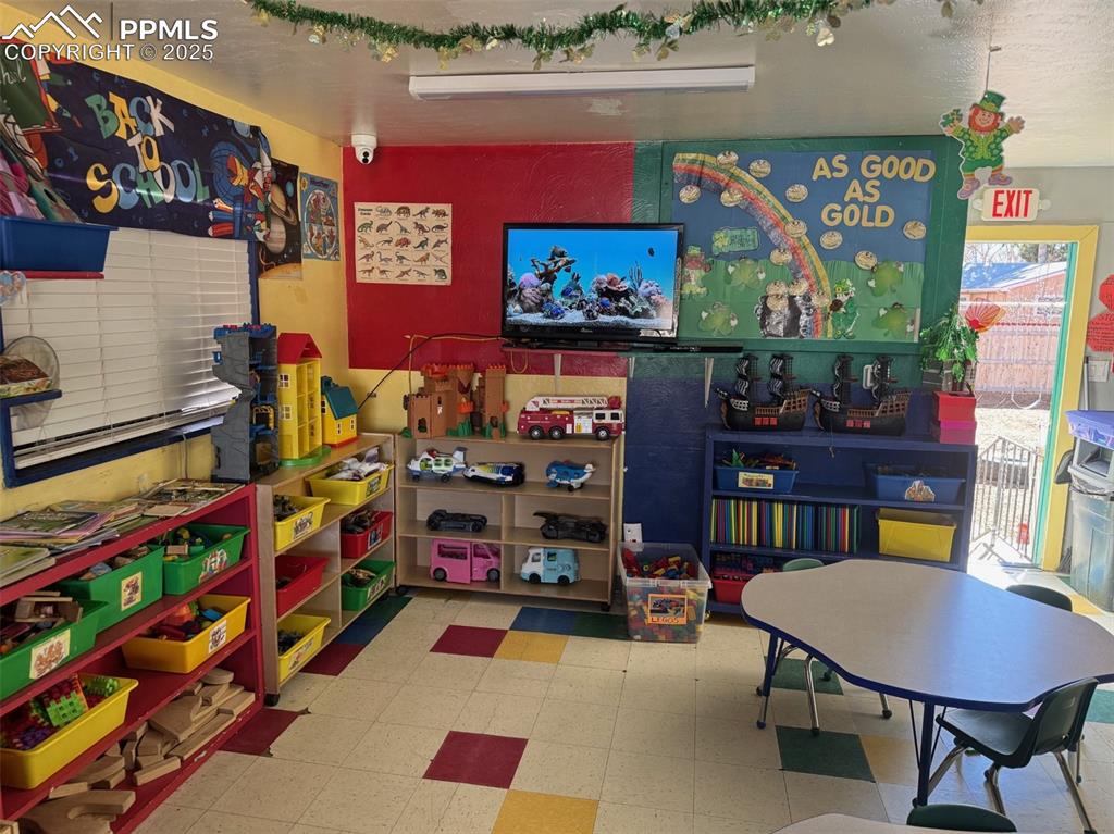 Image 10 of 33: Classroom with tile patterned floors