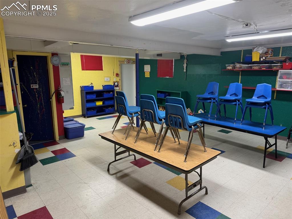 Image 24 of 33: Classroom with tile patterned floors