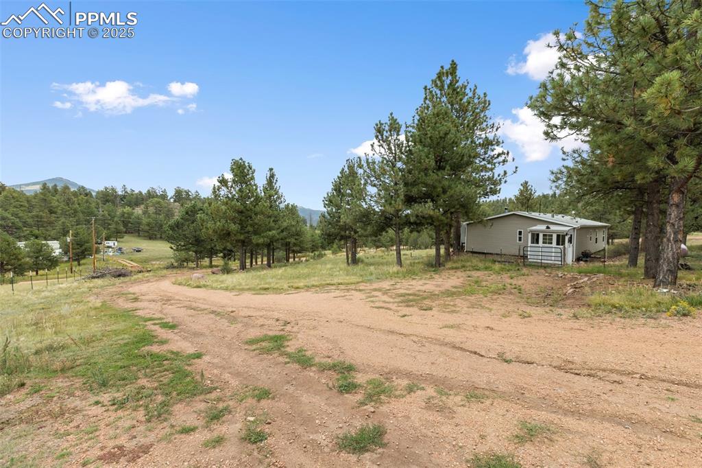 Image 4 of 37: View of yard featuring a view of rural / pastoral area with Mt. Pisgah in t