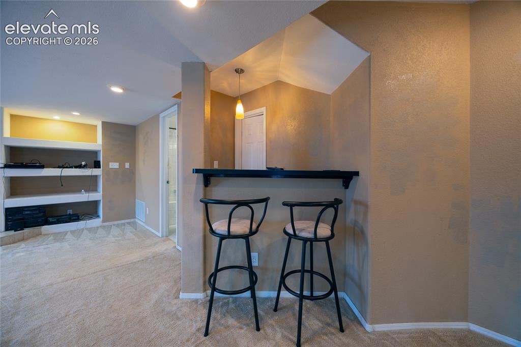 Image 22 of 29: wet bar basement