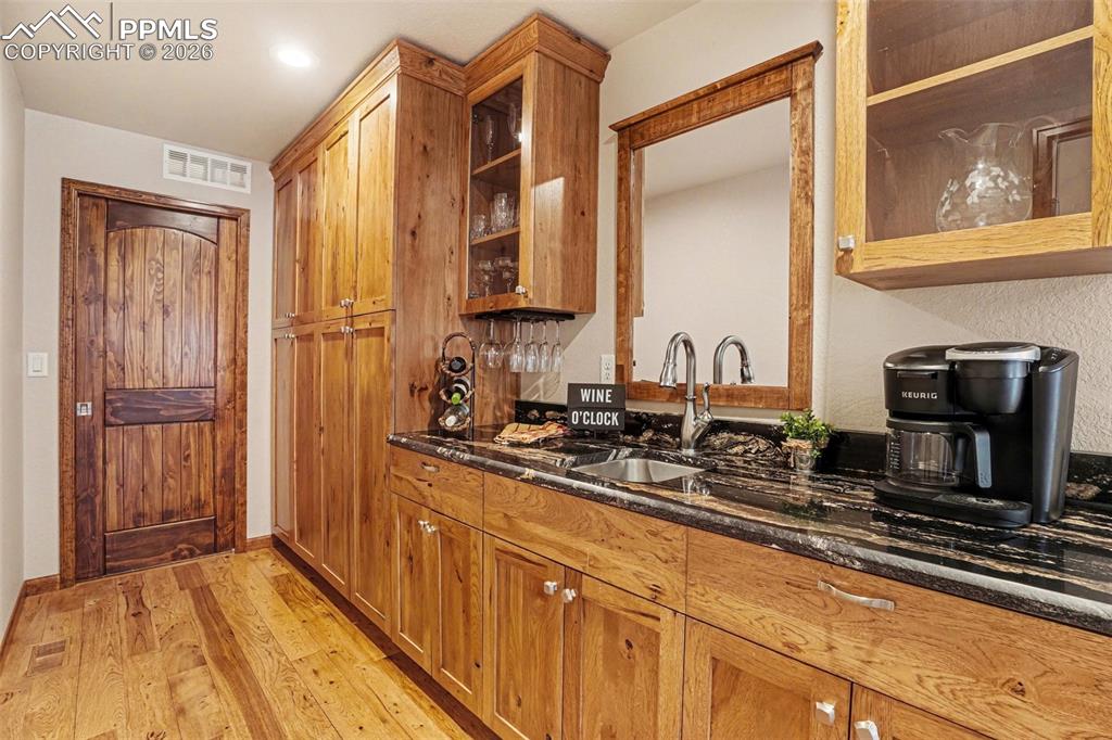 Image 10 of 35: The butler’s kitchen—adds both functionality and extra workspace. This area