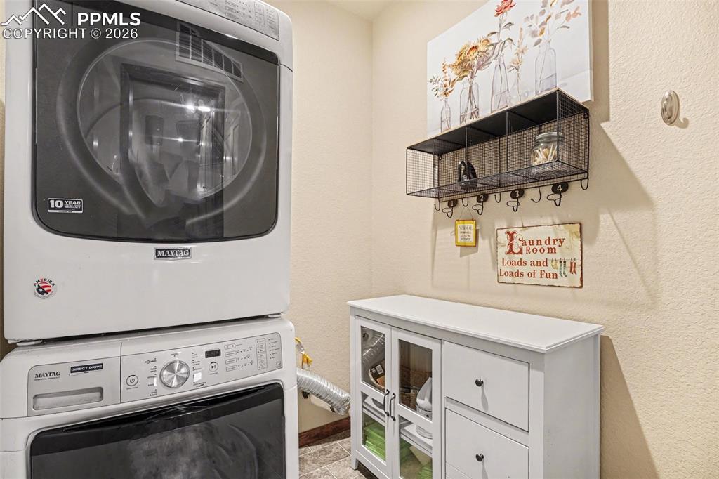 Image 11 of 35: The perfectly sized laundry room designed for both efficiency and convenien