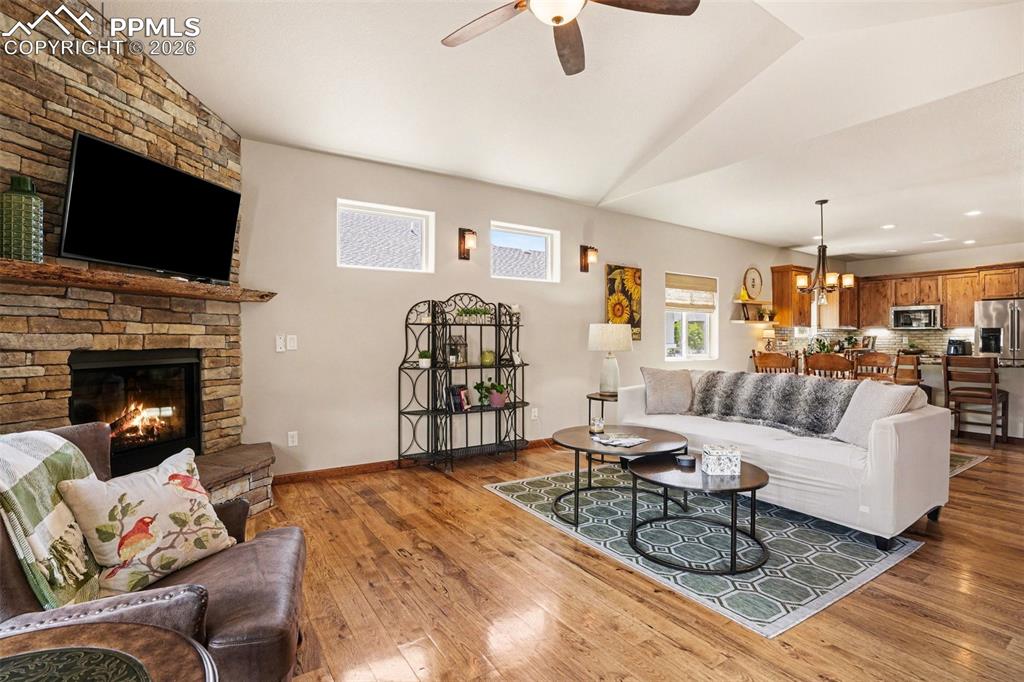 Image 15 of 35: The family room flows seamlessly into the dining area and the kitchen creat