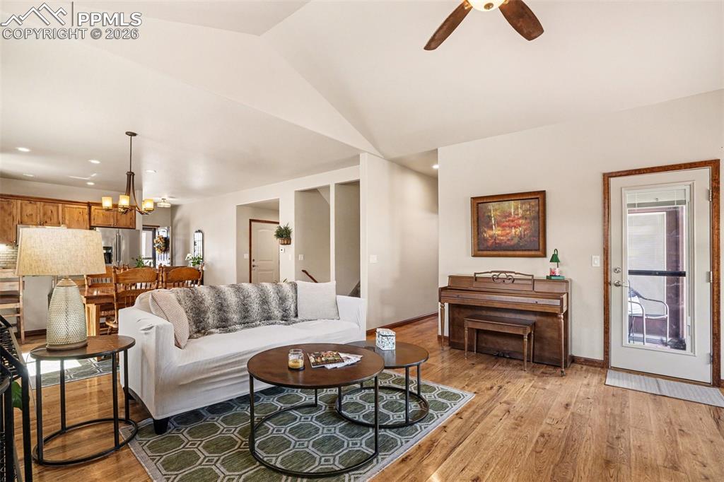 Image 16 of 35: Walk-out doors seamlessly connect the indoor space to the backyard, bringin