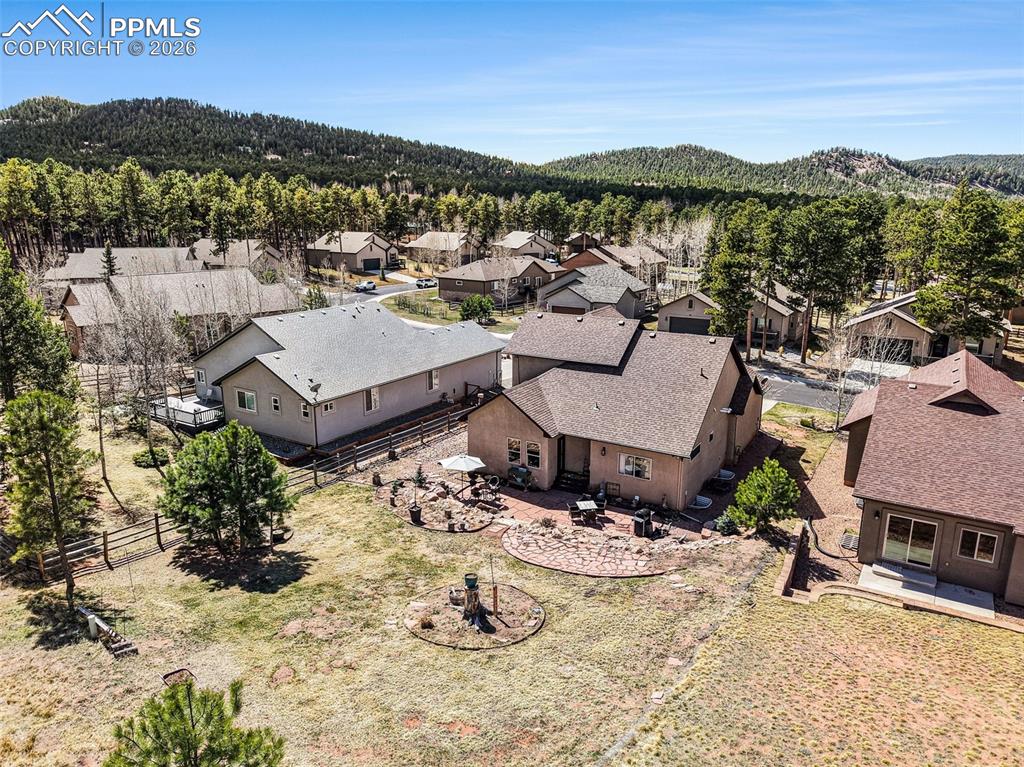 Image 33 of 35: Nestled close to scenic trails and majestic mountains, the home offers easy
