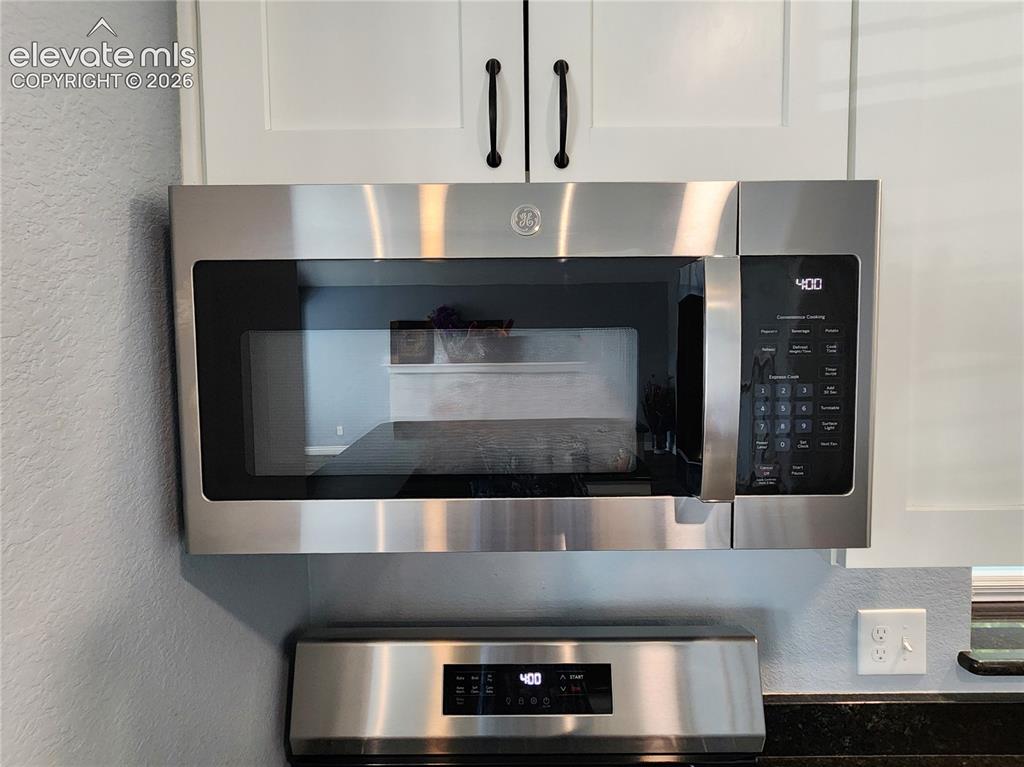 Image 15 of 49: High-quality built-in stainless steel microwave maximizing counter space