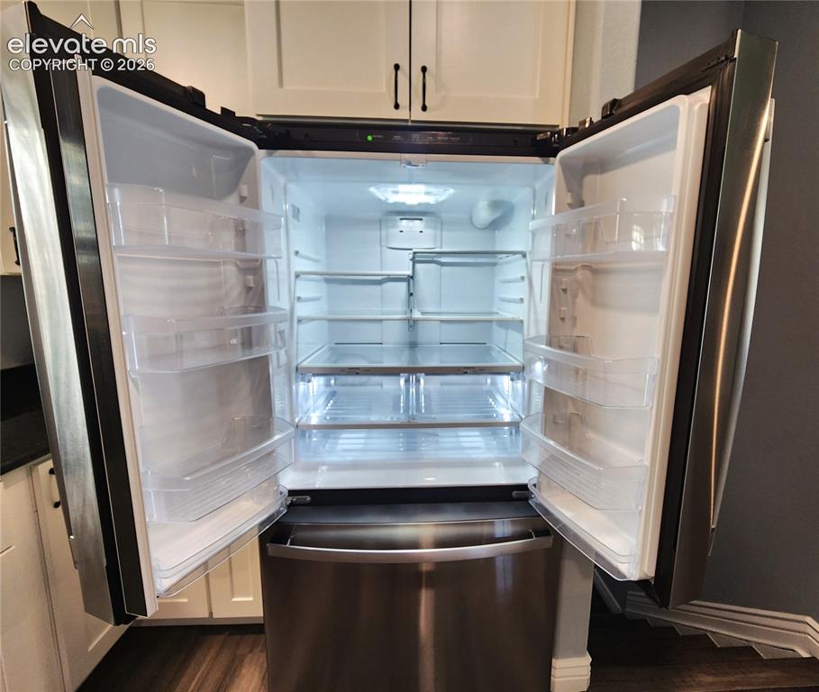 Image 17 of 49: Spacious French door refrigerator offering abundant cold storage