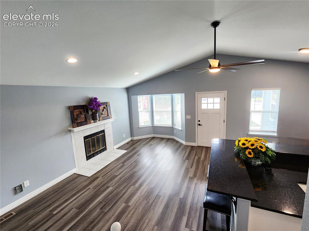 Image 19 of 49: Beautiful open-concept with fireplace