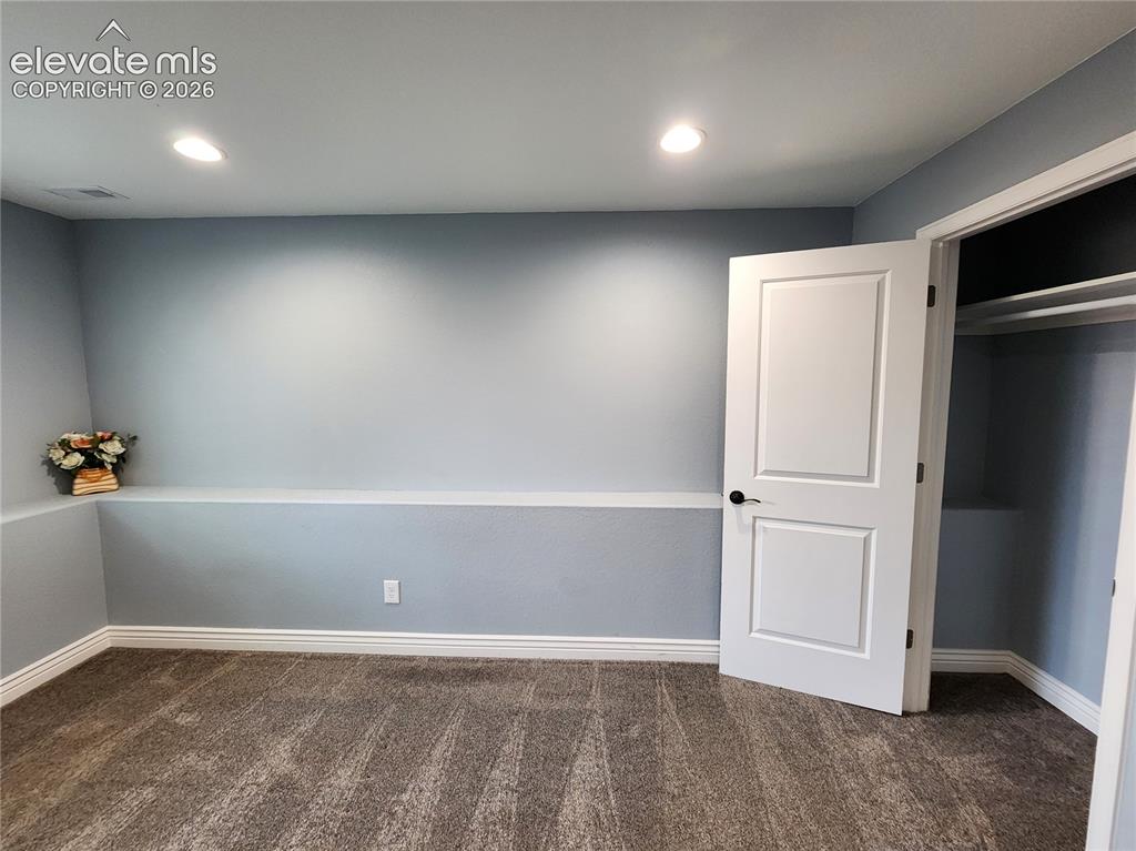 Image 33 of 49: Lower Level Bedroom