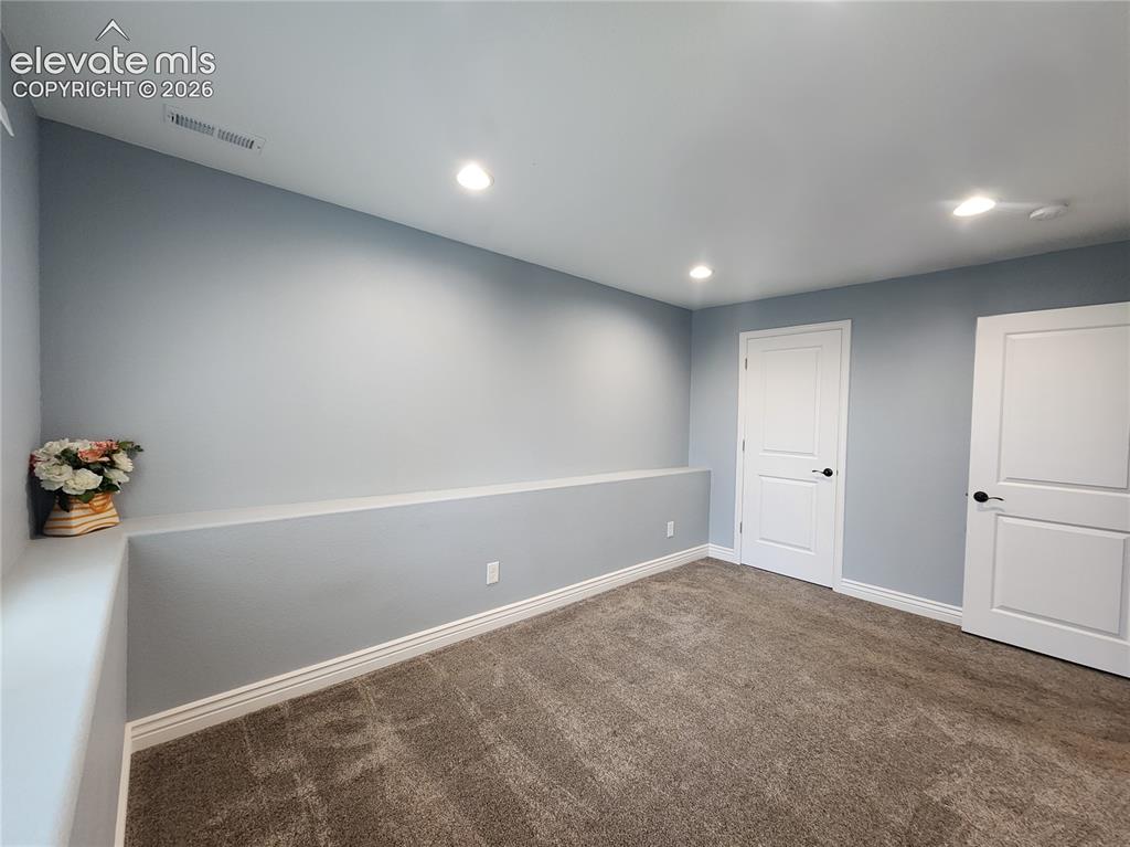 Image 34 of 49: Lower Level Bedroom