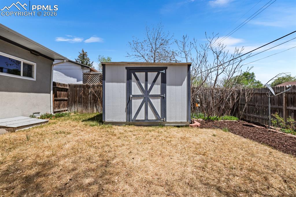 Image 24 of 27: Tuff Shed for tools and toys.