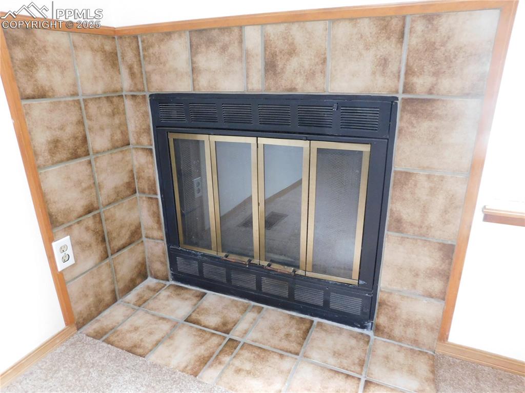 Image 6 of 48: Detailed view of fireplace