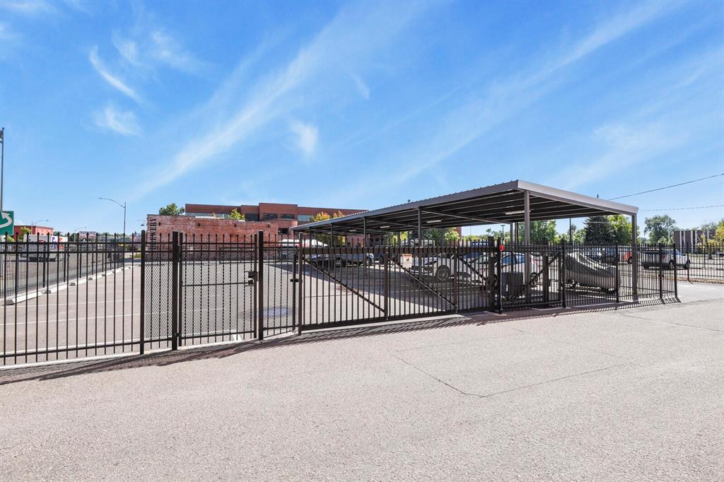 Image 16 of 22: Gated parking area