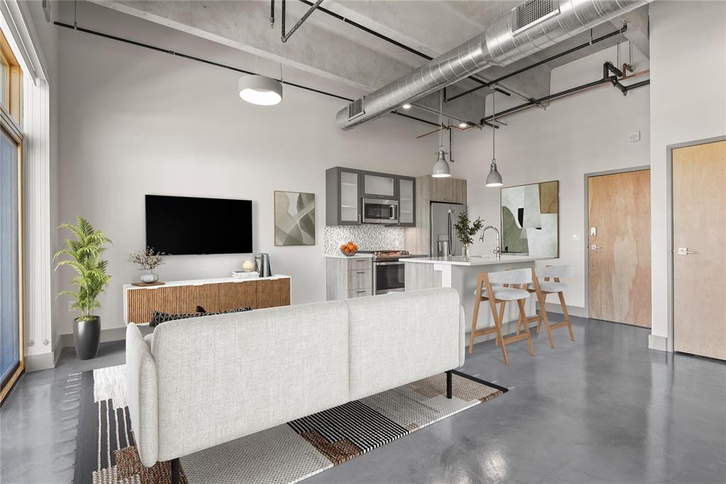 Image 3 of 22: Top-floor loft with industrial finishes. Virtually Staged.