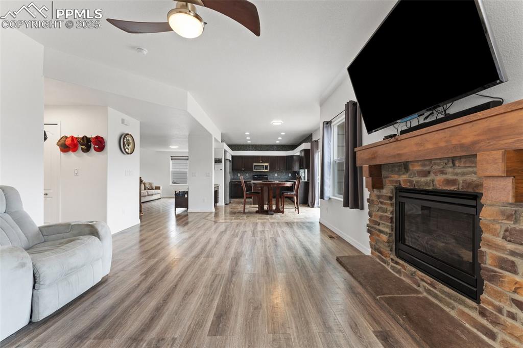 Image 15 of 50: Main Level Family Room with Gas Fireplace