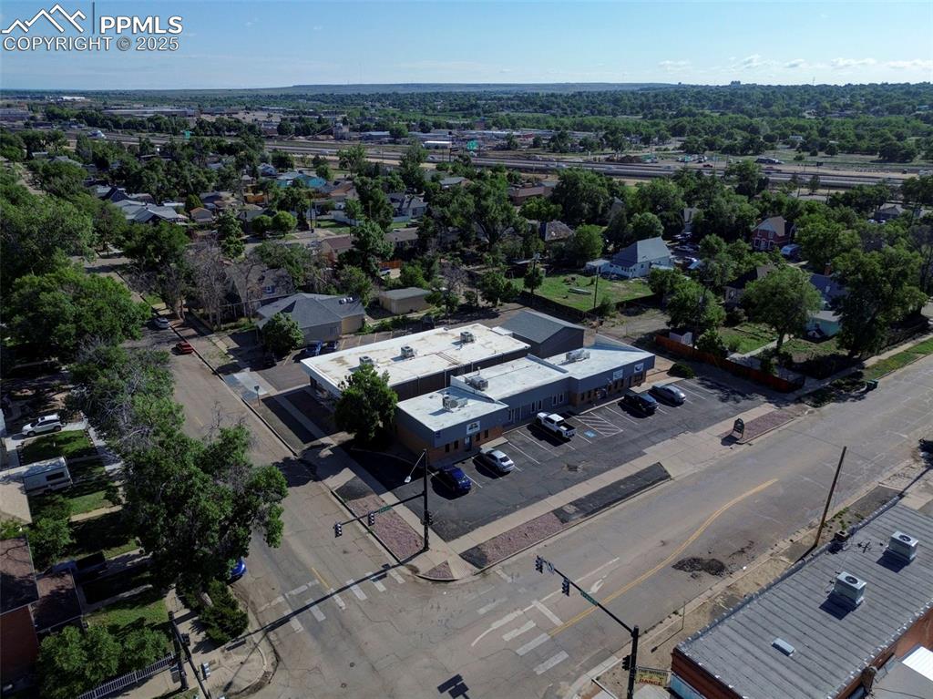 Image 3 of 45: Aerial view of property and surrounding area