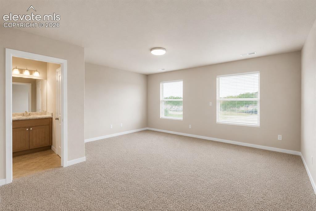 Image 21 of 30: Master Bedroom