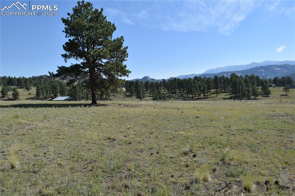 Image 40 of 44: Mountain view featuring rural landscape