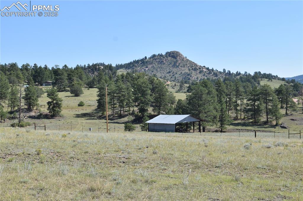 Image 42 of 44: View of mountain backdrop featuring rural landscape