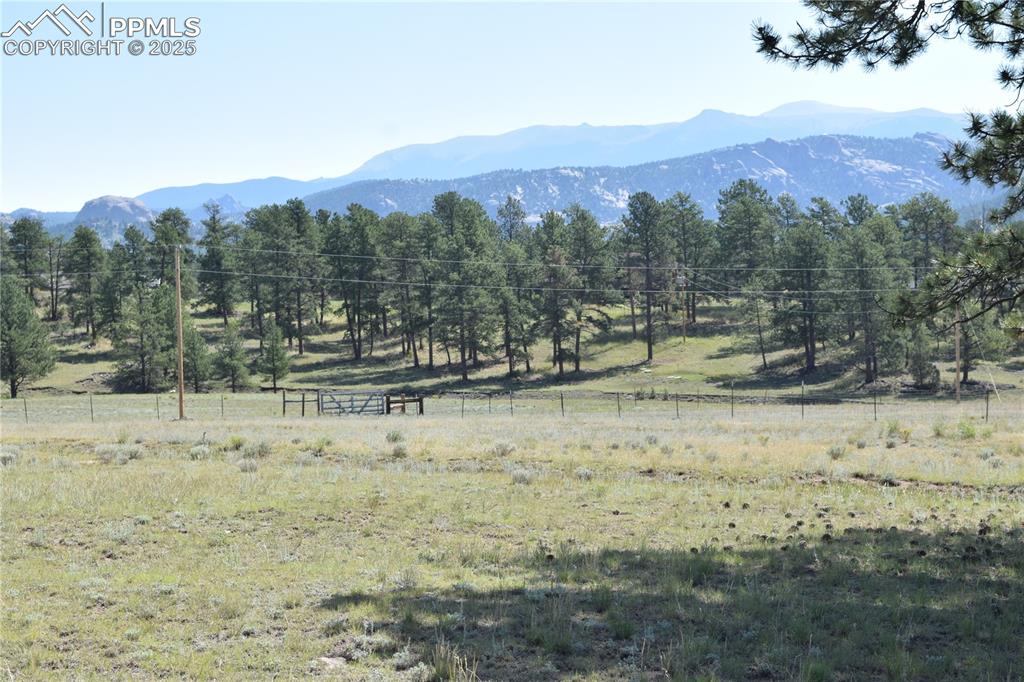 Image 43 of 44: View of mountain background with rural landscape