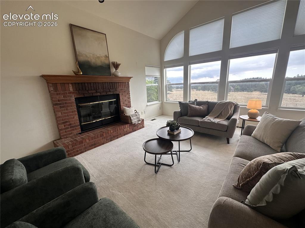 Image 9 of 50: Wall of windows to enjoy the views