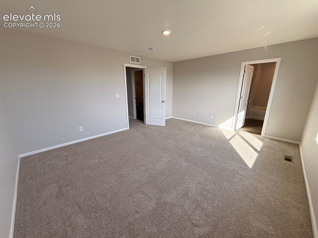 Image 26 of 49: Master Bedroom