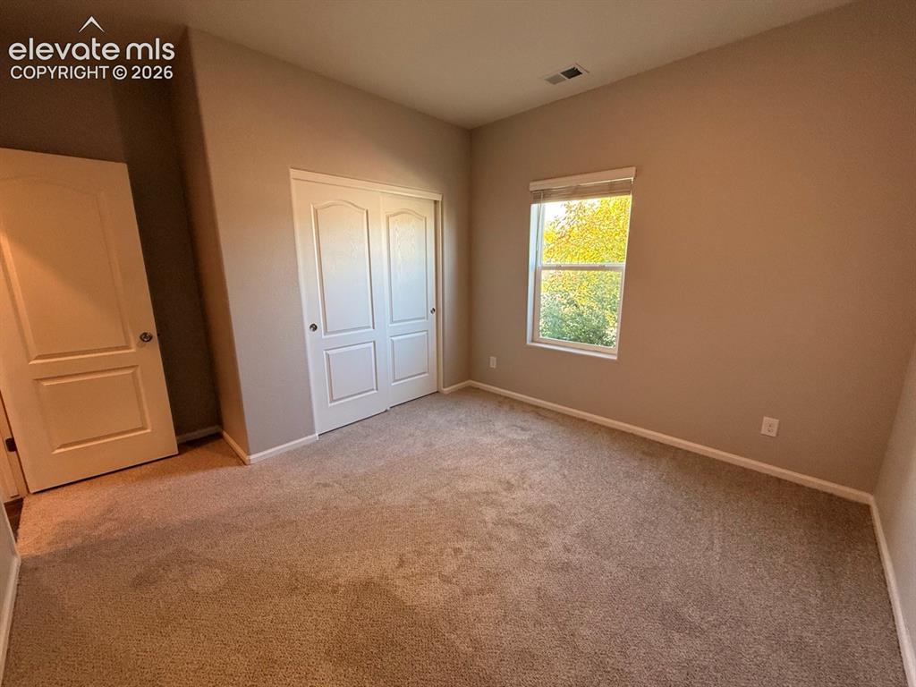 Image 6 of 49: Bedroom
