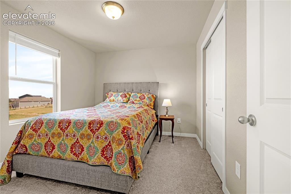 Image 16 of 30: Recessed window, neutral wall paint, carpet flooring, flush mount ceiling l