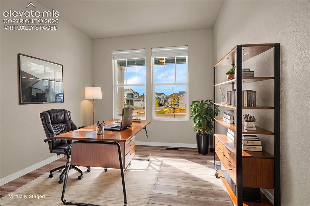 Image 8 of 30: Virtually Staged       Light wood-finish flooring with a neutral wall color