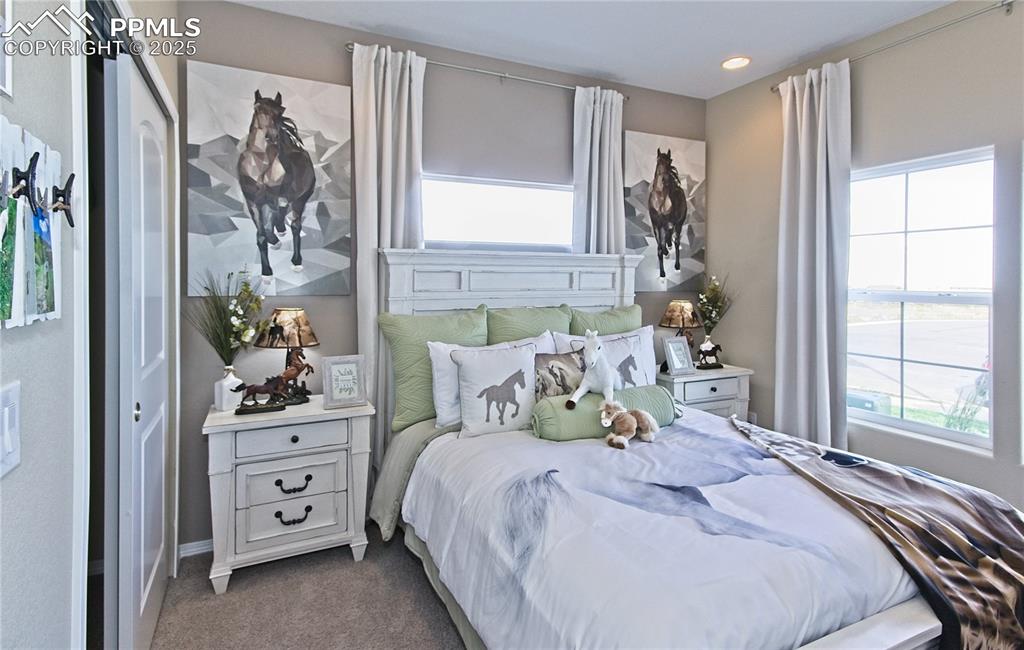 Image 12 of 25: Bedroom featuring carpet floors