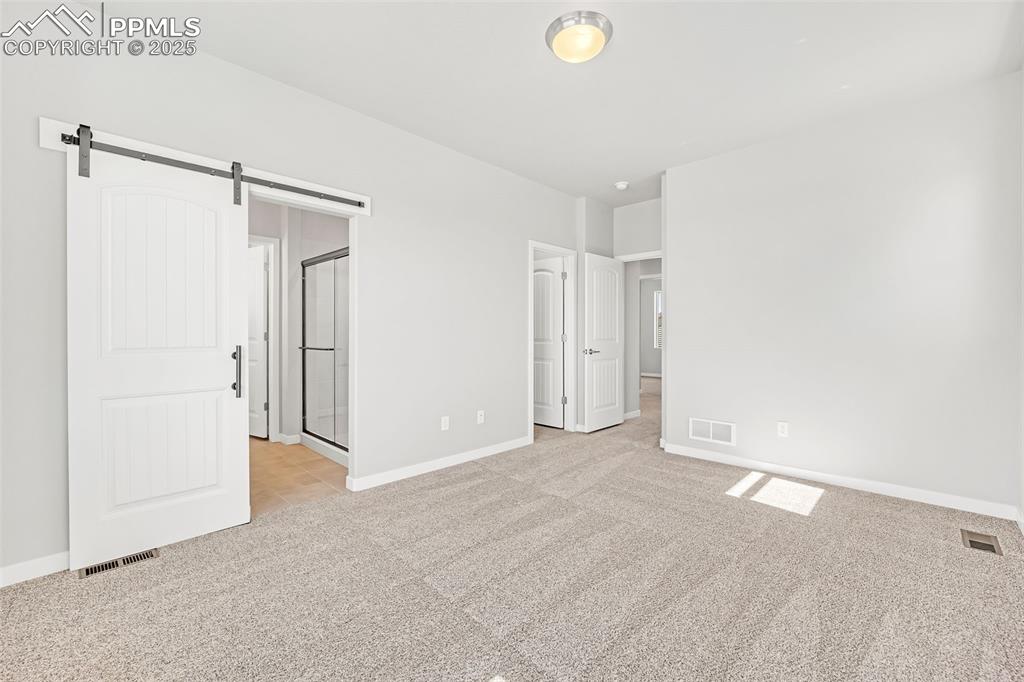 Image 17 of 34: Master Bedroom