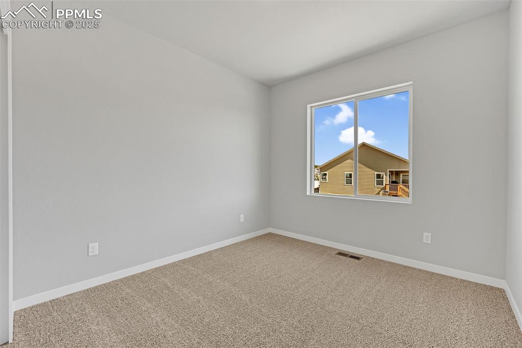 Image 24 of 34: Bedroom