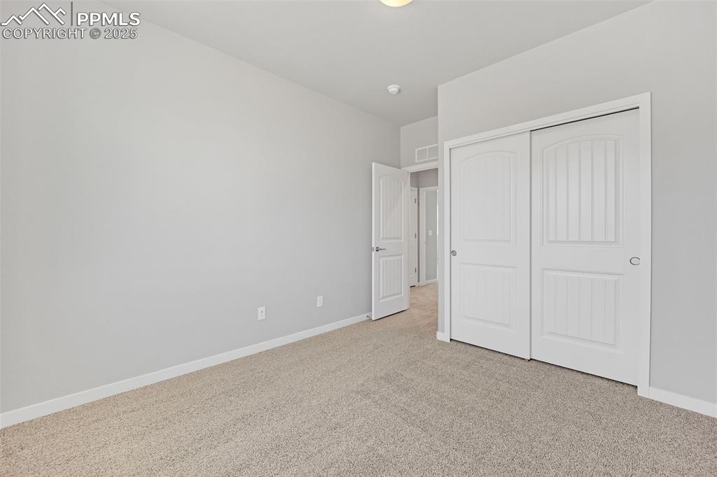 Image 25 of 34: Bedroom