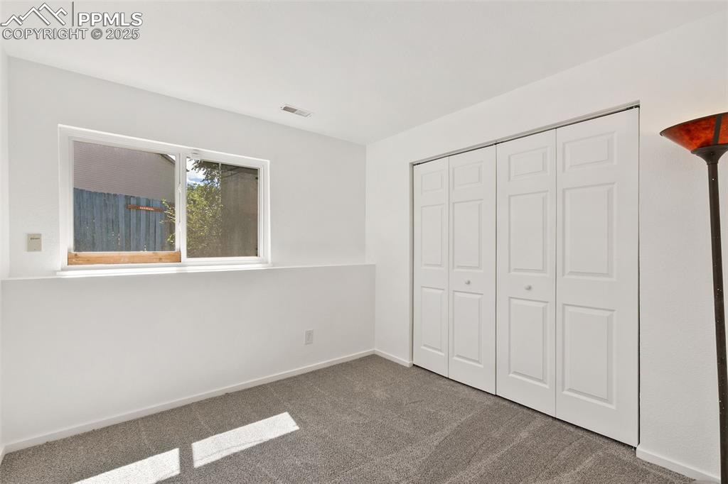 Image 20 of 27: Bedroom