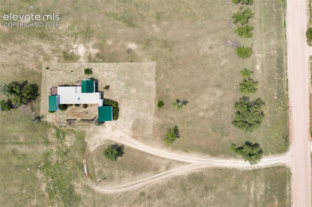 Image 44 of 50: Circular driveway. Sanborn Rd. is on the right