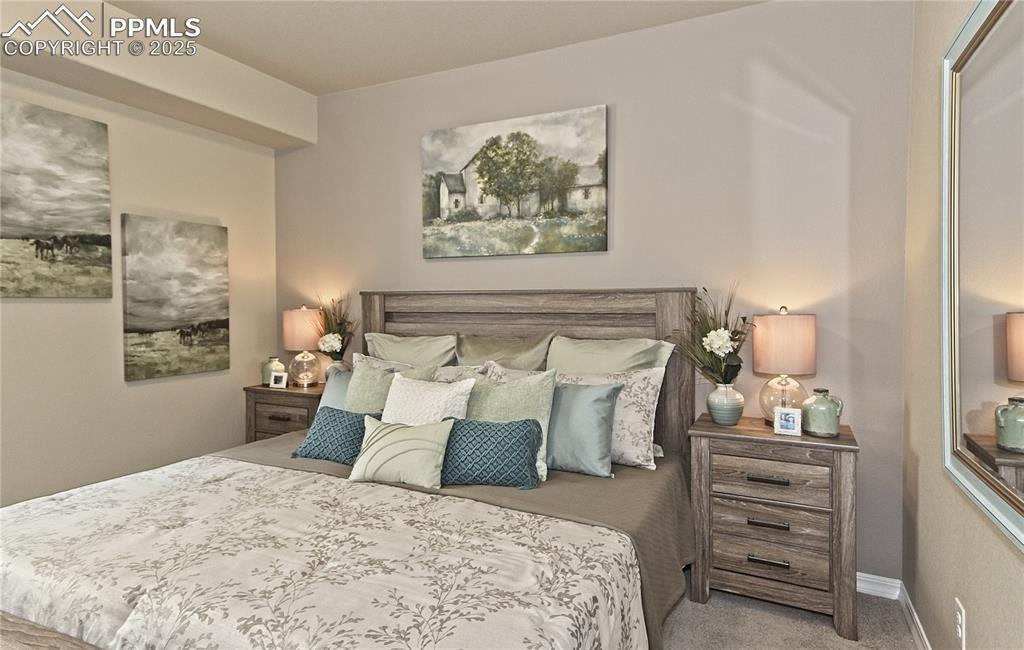 Image 29 of 30: Bedroom featuring carpet floors and baseboards