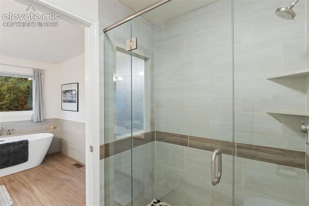 Image 20 of 47: Upper Level Main Bathroom with Stand Up Shower 