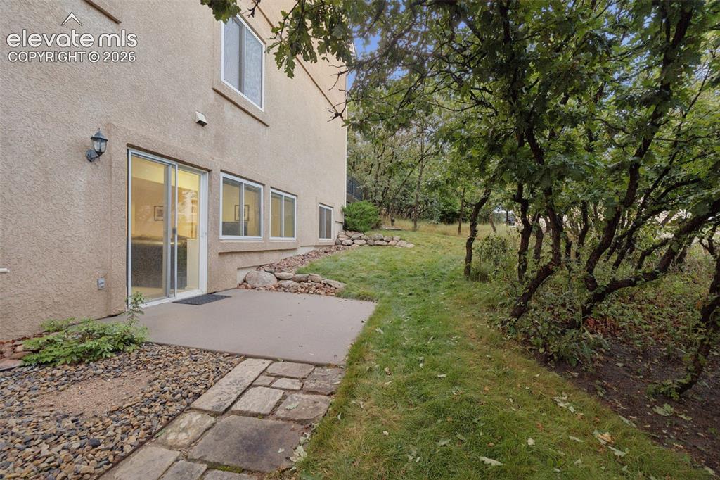 Image 37 of 47: Side yard provides walk out from basement