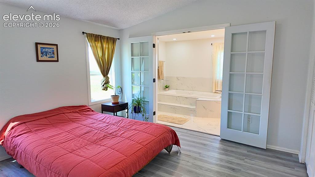 Image 20 of 37: Master Bedroom