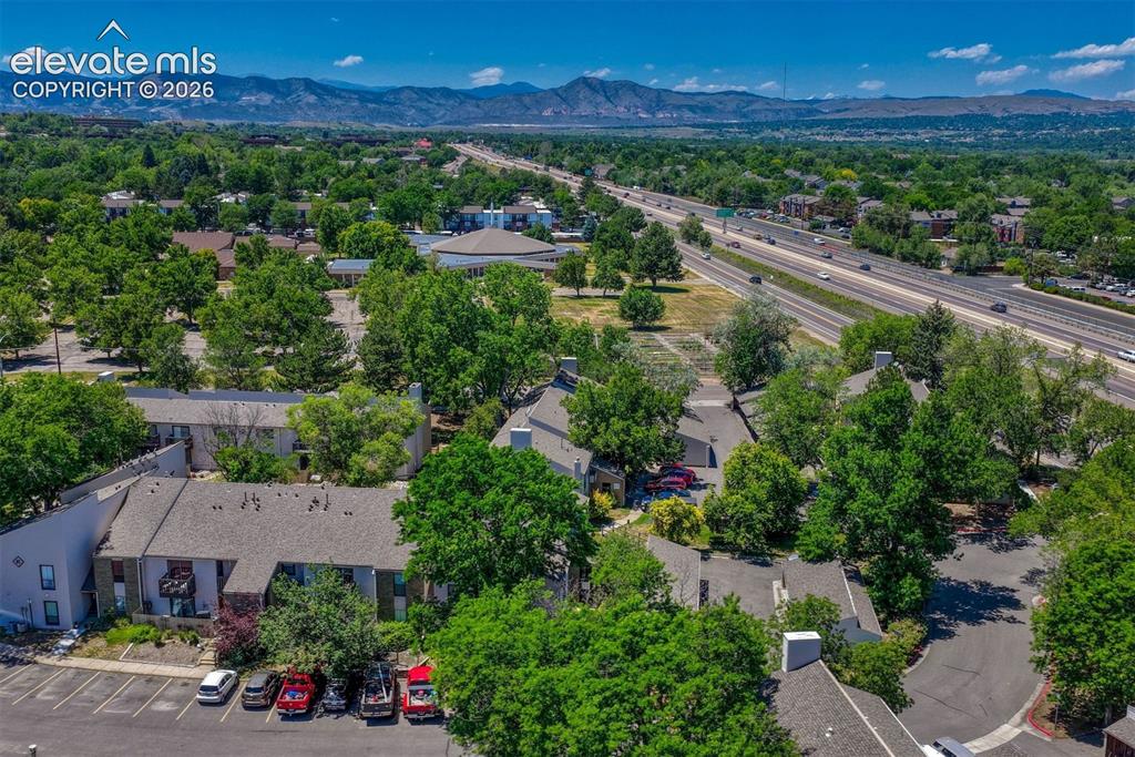 Image 26 of 35: Aerial perspective showcasing the residential complex with surrounding matu