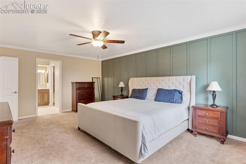Image 23 of 45: Large master bedroom with custom bath and walk-in closet.