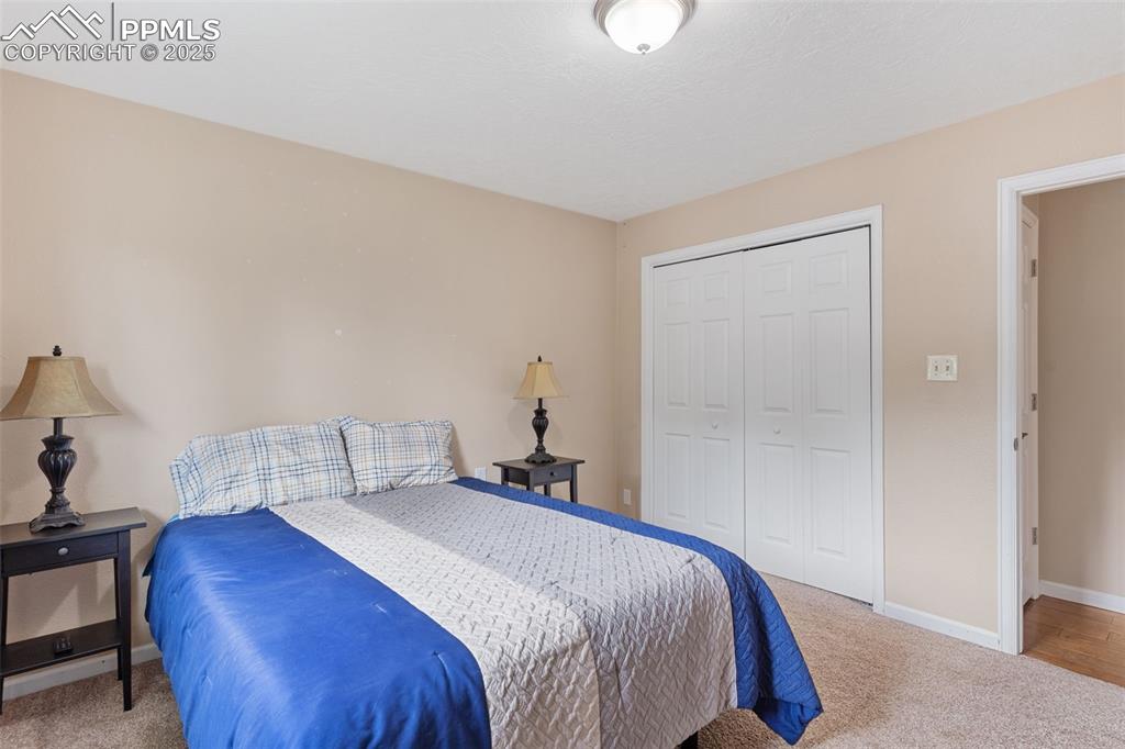 Image 31 of 45: One of 4 upstairs bedrooms.