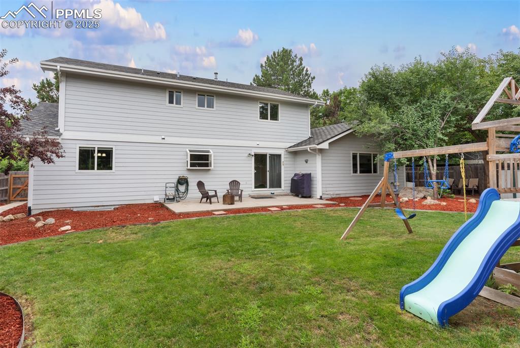 Image 43 of 45: Large backyard with shed.