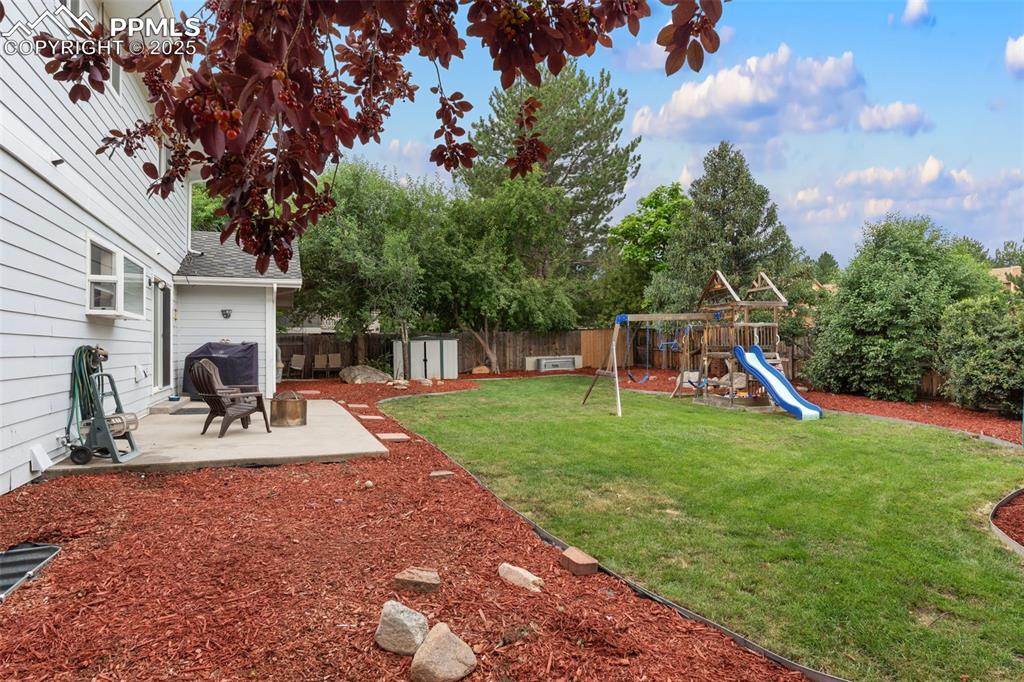 Image 44 of 45: Large backyard with shed.