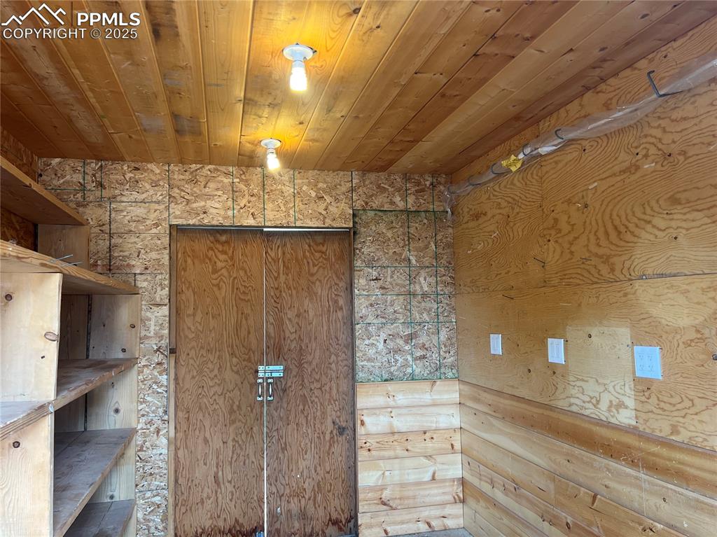 Image 45 of 50: Inside of storage shed w electric