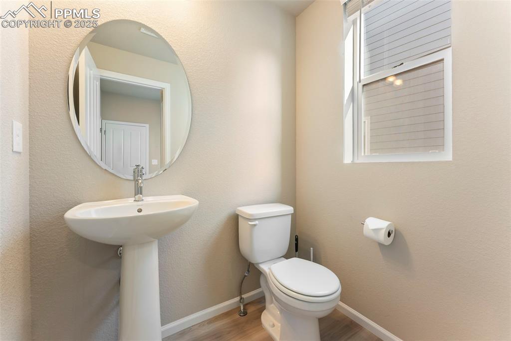 Image 29 of 38: Main Floor Half Bath