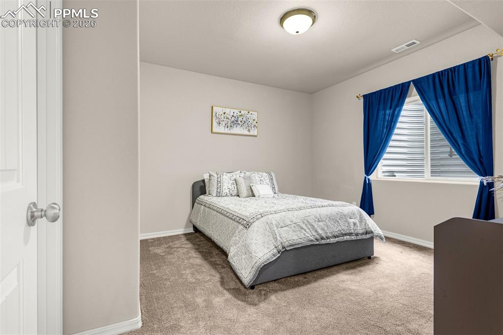 Image 30 of 48: Bedroom