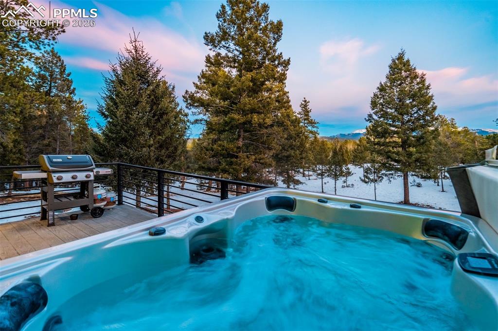 Image 2 of 40: Relax in your Hot tub with privacy and great mountain views
